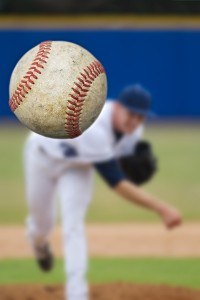 bigstock-Baseball-Pitcher-Throwing-focu-48332414
